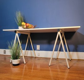 Sleek And Modern. Canadian Made, Welded Sawhorse Table.   - --- - - - - - - - - - - - - - - - - Loc: Bedroom