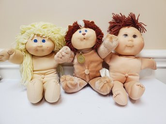 Three Vintage Cabbage Patch Kids Dolls - 2001, 1982 & 1983