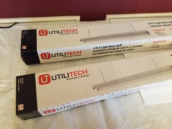 Two New Utilitech 4 Ft 2-Light Shop Lights