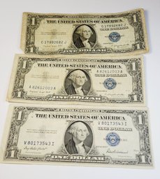 3  - $1 1935(2) (no In God We Trust) And 1957 (1) Blue Seal Silver Certificates