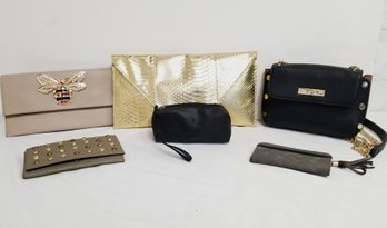 Assortment Of Women's Various Size Wallets And Clutch Bags