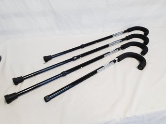 Four Adjustable Length Tubular Metal Canes