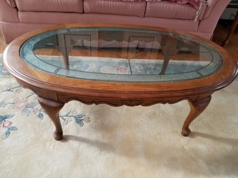Oval Wood And Glass Coffee Table - 48 X 28 X 15H