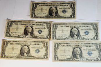 5 - 1957 $1  Blue Seal Silver Certificates **One Is A STAR NOTE Bill