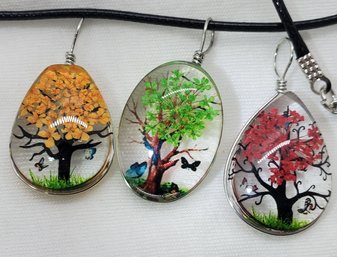 Set Of 3 Interchangeable Glass Encased Tree Pendants With One Rope Necklace