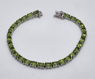 Premium Peridot Tennis Bracelet In Platinum Over Sterling