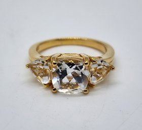 White Topaz 3 Stone Ring In Yellow Gold Over Sterling