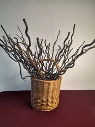 Basket Full Of Swirled Decorative Sticks