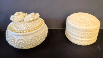 Two Ivory Trinket Containers With Beautiful Designs