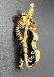 Vintage Man Playing An Instrument Pin