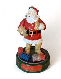 Ertl Coca-Cola Seasons Greetings Cast Iron Christmas Santa Claus Coin Bank, 20th Century.