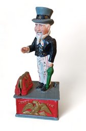 Reproduction Cast Iron Uncle Sam Mechanical Coin Bank, 20th Century