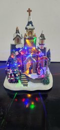 Musical Lighted And Revolving Christmas Village In Working Condition. Batteries Are Not Included