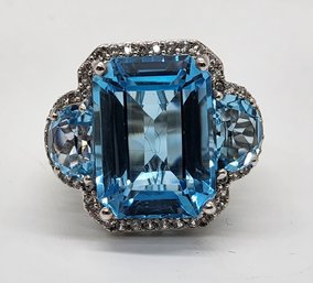 Sky Blue Topaz, White Zircon Ring In Platinum Over Sterling