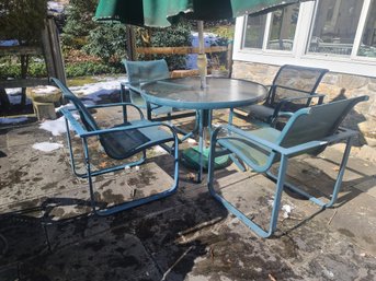 Outdoor Metal And Glass Table And Four Chairs