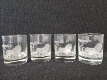 Four ARC Clear Glass Etched Lion Rocks Glasses