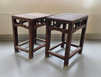 Two Chinese Carved, Paneled And Turned Stained Wood Stools