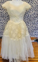 A True Princess Style Antique Dress With Detailed Pearl Applique And An Underlayer Of Ivory Touille