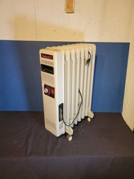 Shetland Electric Heater (Fluid Filled) Tested And Working. - - - - - - - - - -- - - - - -- Loc: Basement