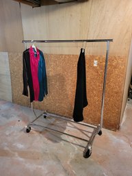 Clothing Rack.  Professional Grade.  Collapsible.  2 Available. - - - - - - - - - - - - - - - - - -Basement.