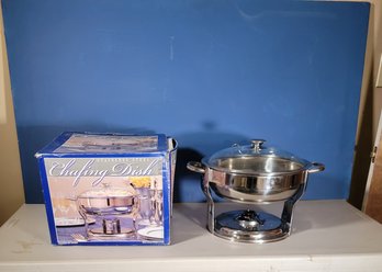 Stainless Steel Chafing Dish.  Round With Glass Top.  The Back Holds The Top.  - - - - - - - - - - - Loc: GS1