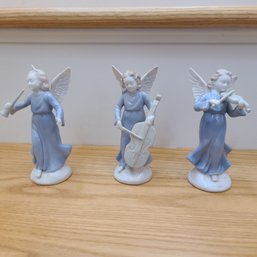 Trio Of Ceramic Angel Figurines Playing Instruments