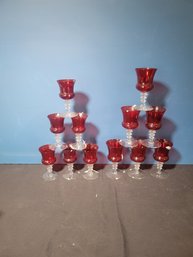 Set Of 12 Red Glasses.  6 Of Each Size. - - - - - - - - - - - - - - - - - - - - - - - - - - - - - Loc: Garage