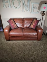 Leather Love Seat. ( Couch, Sofa).  Espresso Leather.  Nice Shape.. - - - - - - - - - - - - -Loc: Garage.