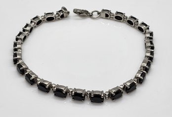 Black Spinel Tennis Bracelet In Stainless Steel