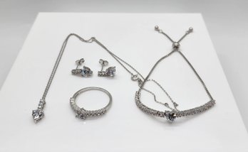 Premium White CZ Earrings, Ring, Bolo Bracelet & Pendant Necklace In Rhodium Over Sterling
