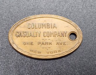 Antique Columbia Casualty Company New York Brass Badge