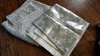 Two Pieces Of Silver Fabric