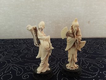 Pair Of Asian Sculpted Men Figurines