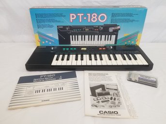 Casio PT-180 Keyboard Piano Synthesizer With ROM Pack, Box & Manual