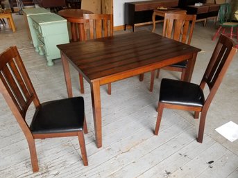 Small Wood Dining Table With Four Padded Chairs