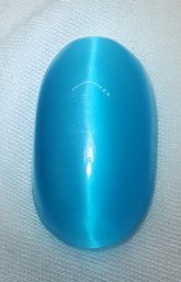 Stunning 50 Carat Sky Blue Cat's Eye Gemstone 34.92mm X 15.88mm X 7.95mm