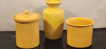 Yellow Ceramic Canisters And Vase