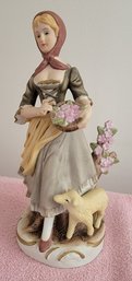 Vintage Porcelain Figure Of A Woman With Flowers And Sheep