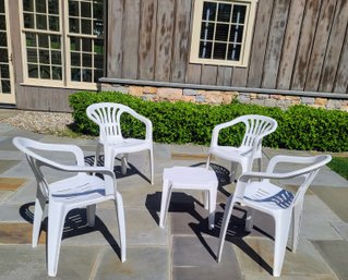 12 Chairs And 3 Tables Total A Set Of 4 White Resin Outdoor Chairs Pictured With Side Table