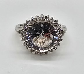 Concave Cut White Topaz Halo Ring In Platinum Over Sterling