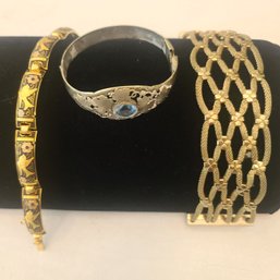 Three Pretty Vintage Gold Tone Bracelets: Hinged With Birds, Bangle With Faux Gem, And Lattice Pattern