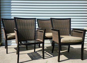 Four Metal Framed Wicker Chairs With Cushions