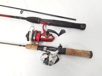 Two Shakespeare Fishing Rods With Shakespeare Reels