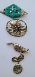 Assorted Sterling Earrings, Enamel & Sterling Pins. Plus   A MEDALLION BY GEORG JENSON