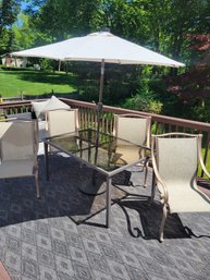 Aluminum And Glass Patio Set With 4 Chairs.  Solar Light Up Umbrella Included !