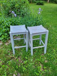 Pair Of Counter Height Wood Stools With Wicker Seats.  - - - - - - - - - - - - - - - - - - - - - - - Loc: Gar