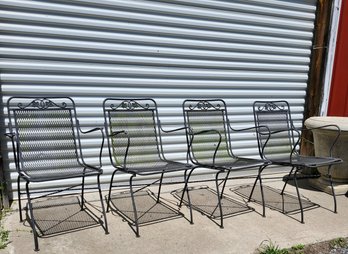 Four Wrought Iron Patio Arm Chairs