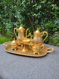 Coffee And Tea Service In Gold Color.  Heavy To The Touch. ---- - - - - - - - - - - - - --- - - - Loc: Keter.