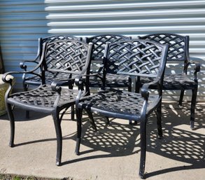 Five Cast Metal Patio Arm Chairs