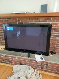 Panasonic  58' Flat Screen T.v. With Books And Remote. Tested And Working